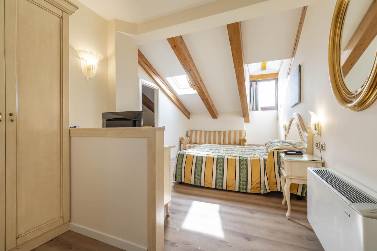 Room (Attic) | Down comforters, minibar, in-room safe, individually decorated