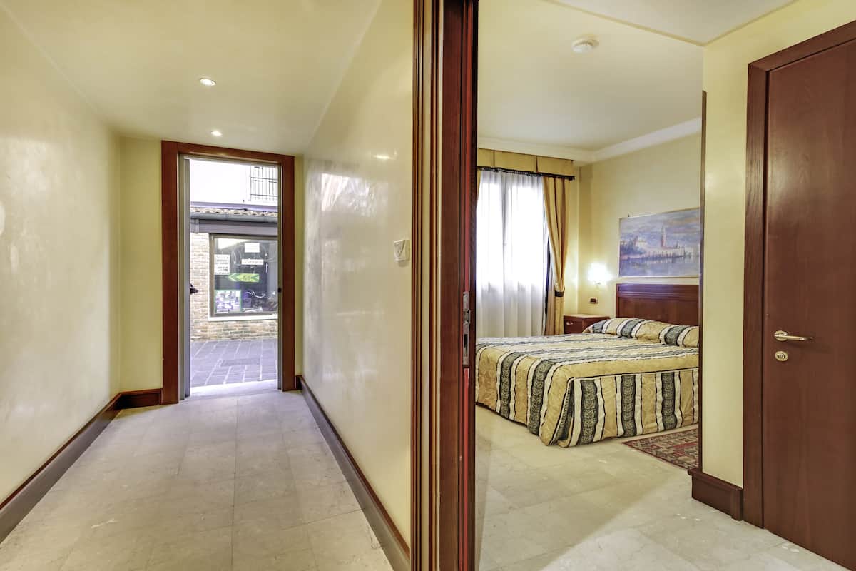 Down comforters, minibar, in-room safe, desk