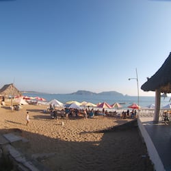 On the beach, sun loungers, beach umbrellas, beach towels
