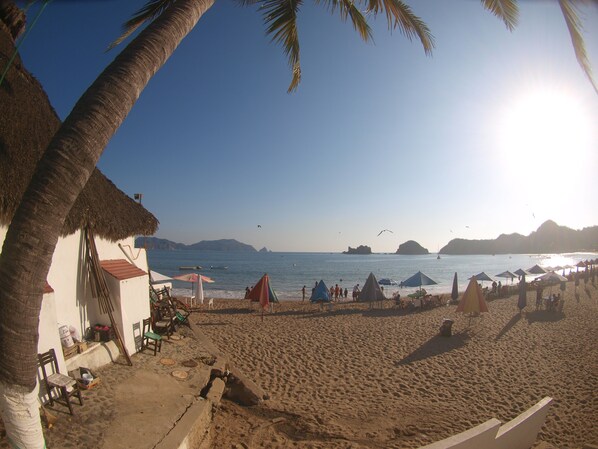 On the beach, sun loungers, beach umbrellas, beach towels