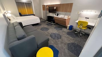 Suite, 1 Queen Bed, Non Smoking | Living area | 32-inch LED TV with cable channels, TV, pay movies