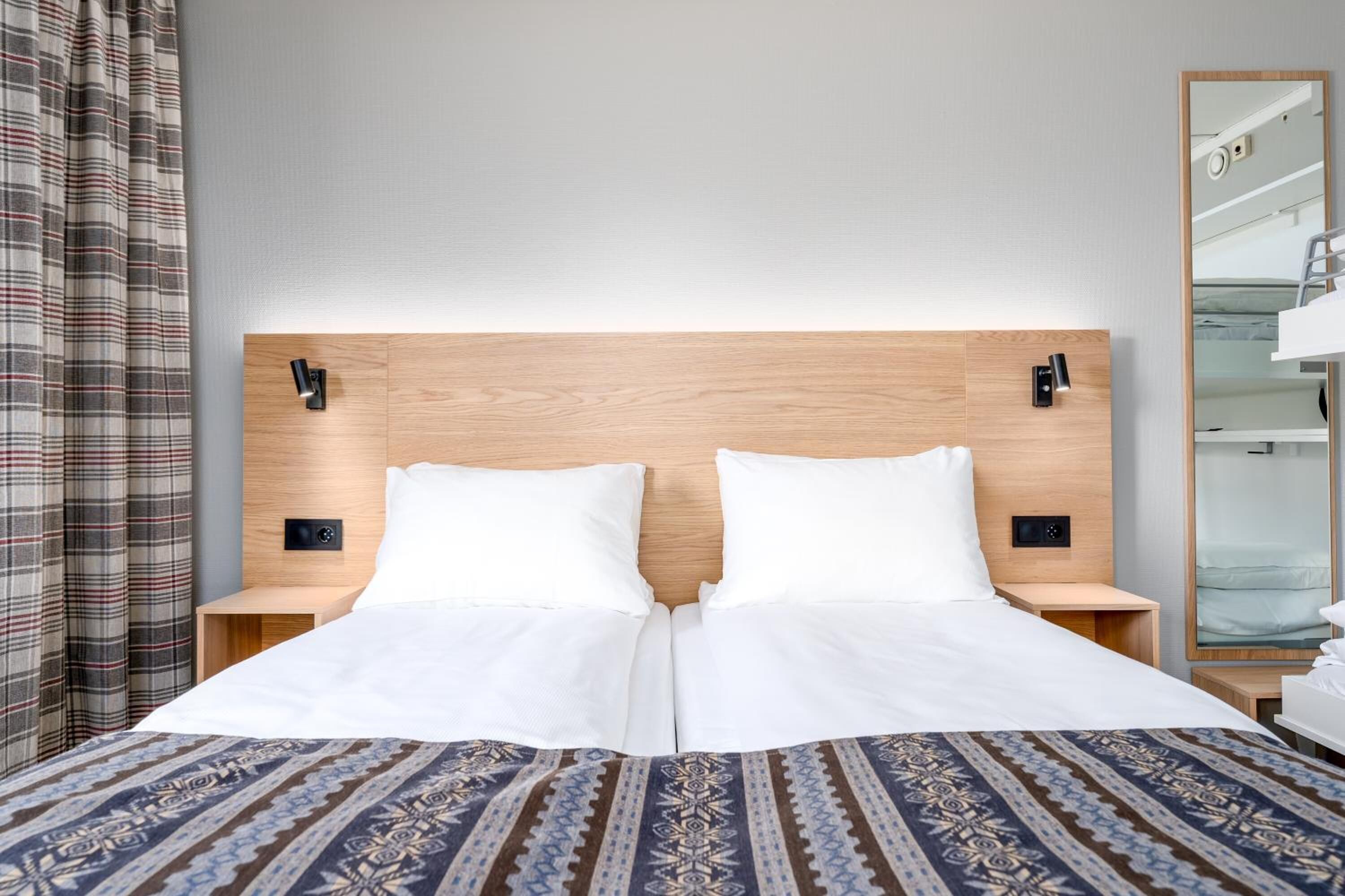 pillow-top beds, blackout curtains, cots/infant beds, rollaway beds