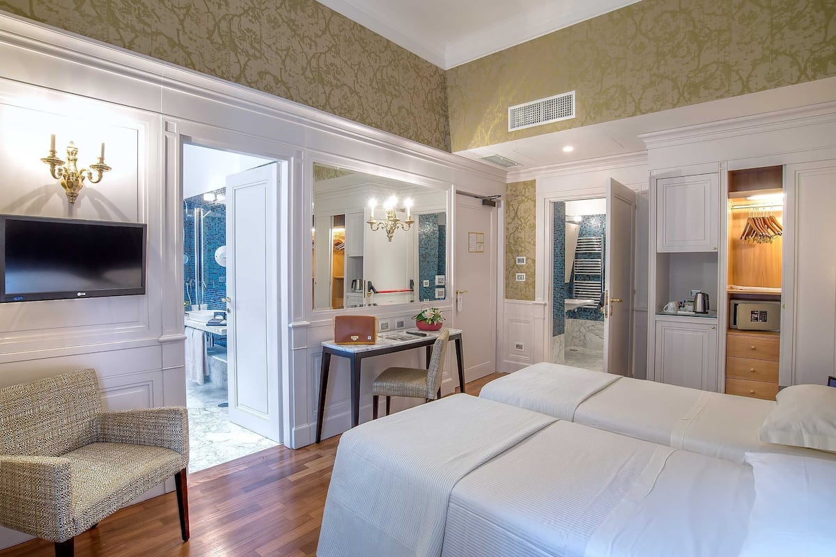 standard double room | premium bedding, minibar, in-room safe, individually decorated