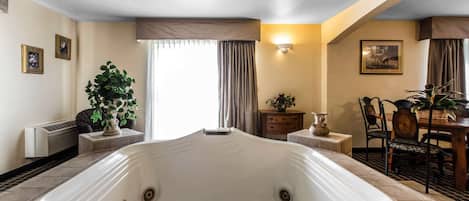 Suite, 1 King Bed, Non Smoking | Premium bedding, in-room safe, iron/ironing board, rollaway beds