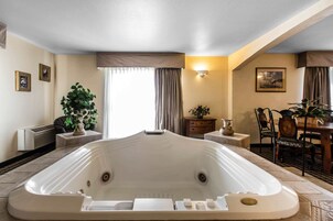 Suite, 1 King Bed, Non Smoking | Premium bedding, in-room safe, iron/ironing board, rollaway beds