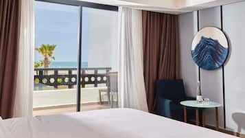 Chambre Deluxe, 1 trÚs grand lit, vue océan | Draps en coton égyptien, literie de qualité supérieure, surmatelas