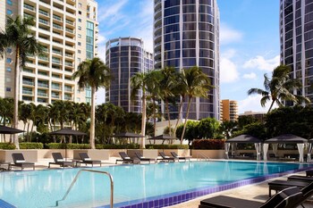 Outdoor pool, cabanas (surcharge), pool umbrellas at The Ritz-Carlton Coconut Grove, Miami