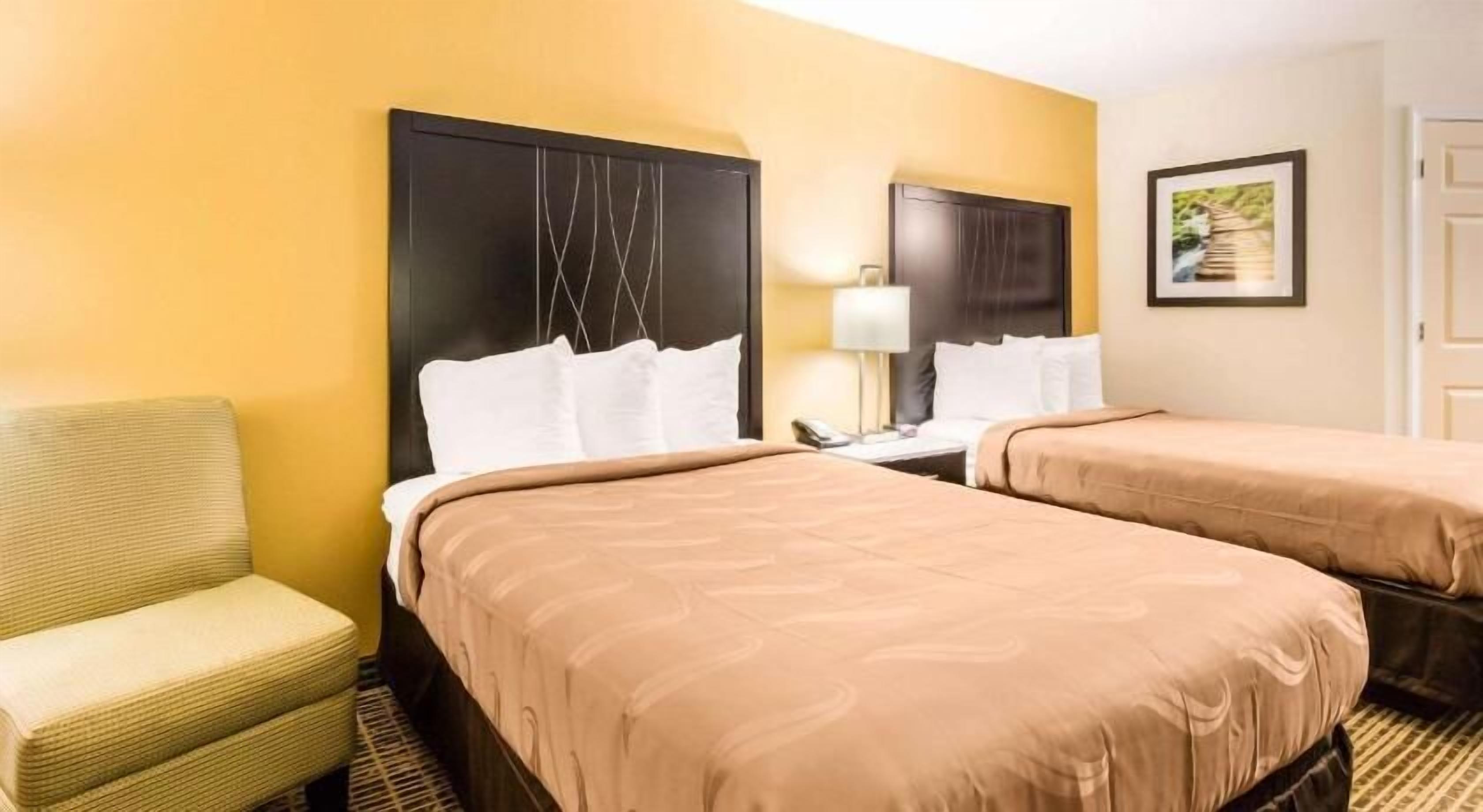 Premium bedding, pillowtop beds, desk, blackout drapes