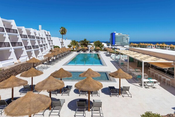 2 outdoor pools, pool umbrellas, pool loungers