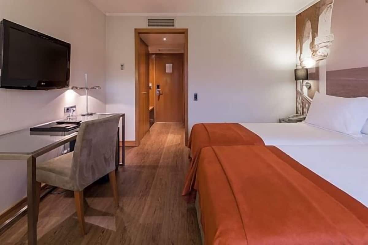 Select Comfort beds, minibar, in-room safe, desk