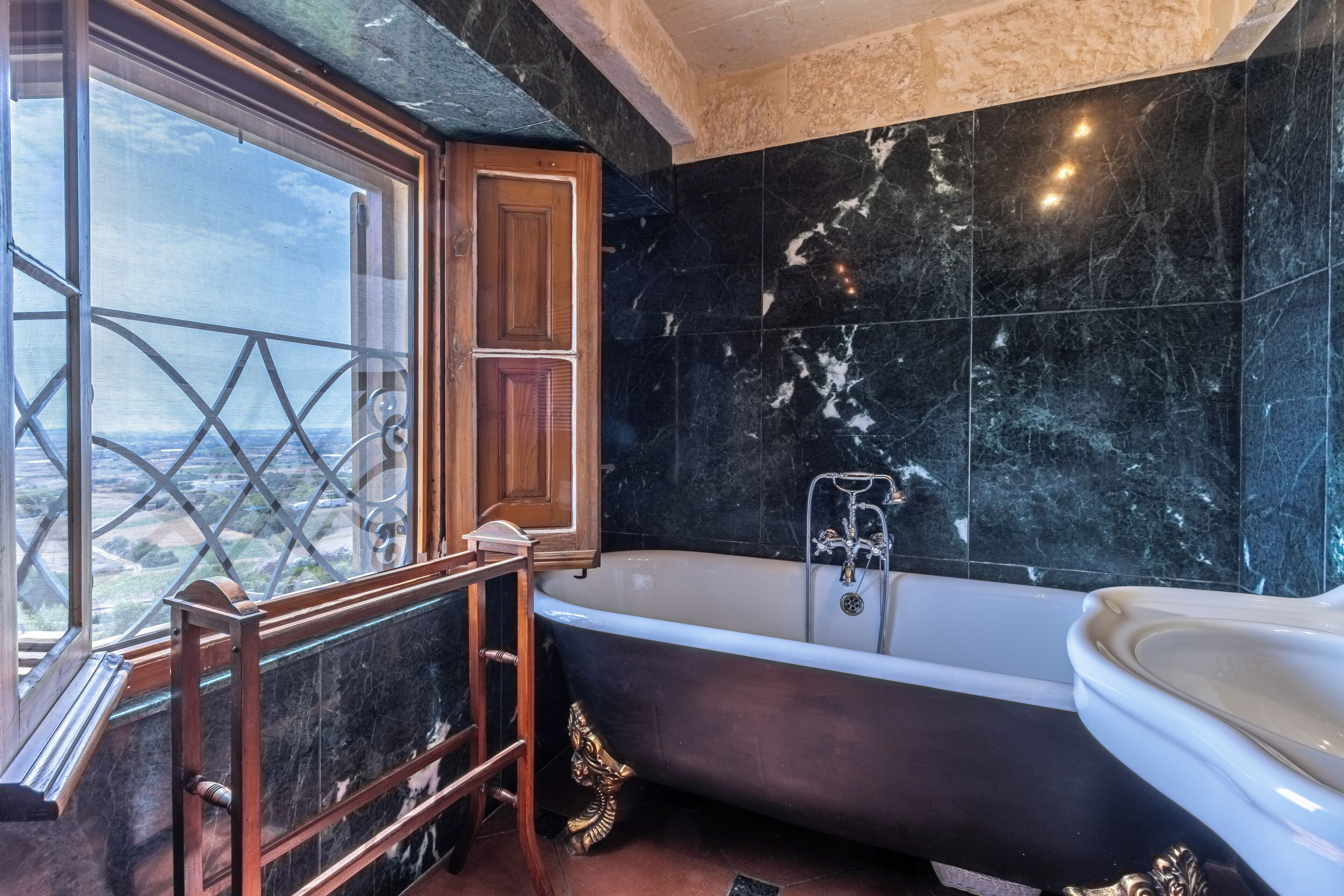 bastion chateaux | bathroom | combined shower/bathtub, free toiletries, hair dryer, bathrobes