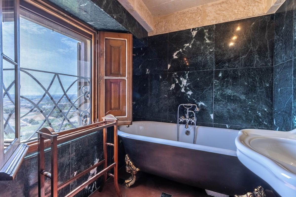 bastion chateaux | bathroom | combined shower/bathtub, free toiletries, hair dryer, bathrobes