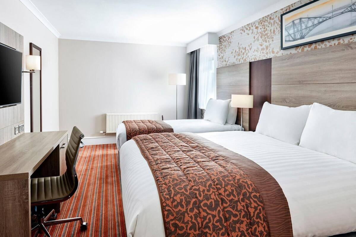 In-room safe, desk, iron/ironing board (on request), cribs (free)
