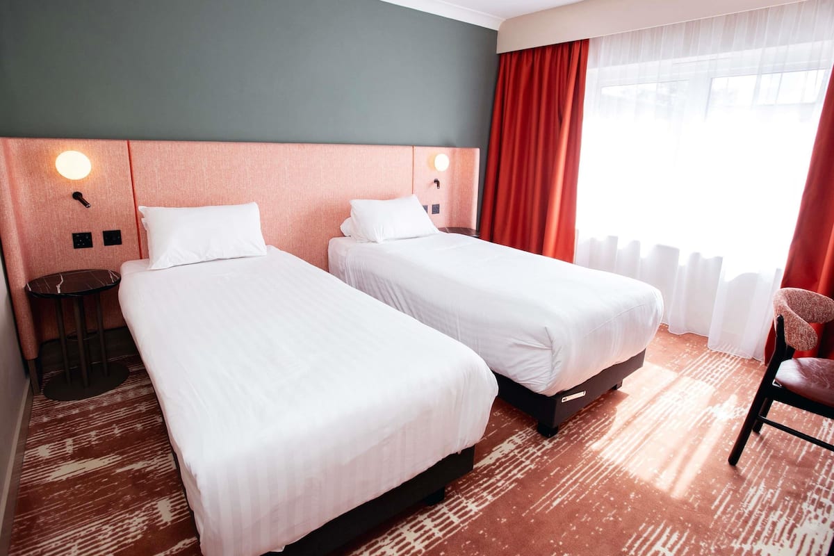 Classic Room, 2 Single Beds | Hypo-allergenic bedding, desk, blackout curtains, iron/ironing board