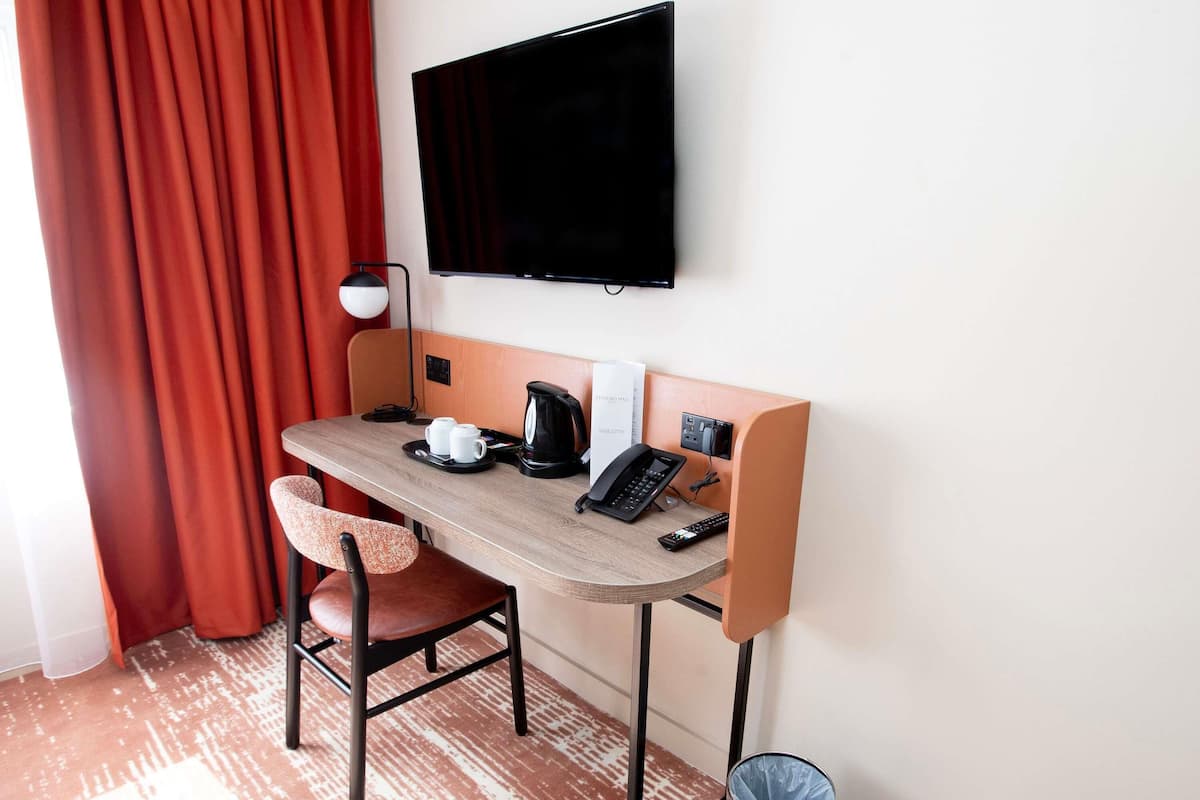 Desk, blackout drapes, iron/ironing board, free WiFi
