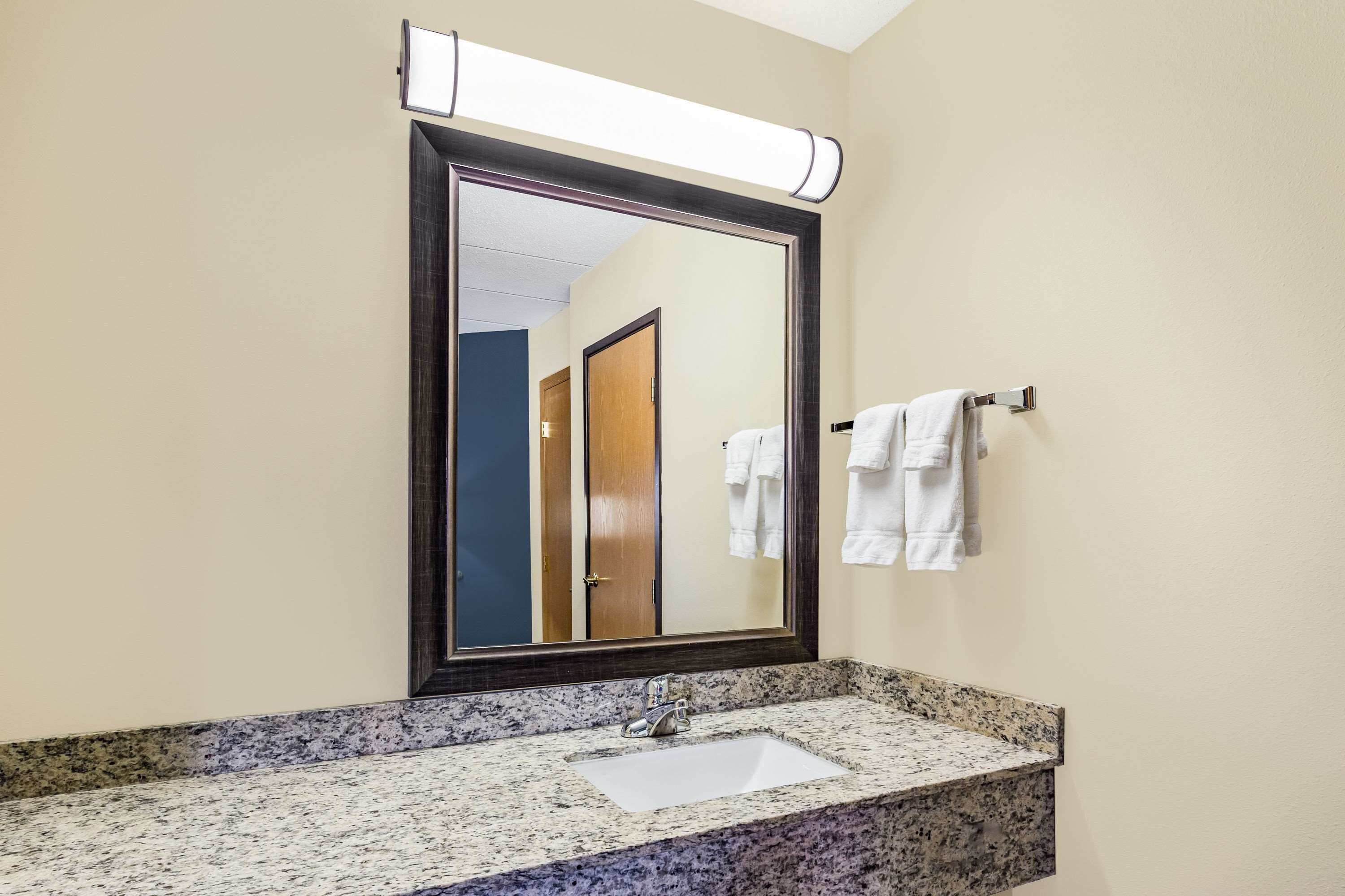 deluxe room, 2 queen beds, non smoking | bathroom | hair dryer, towels