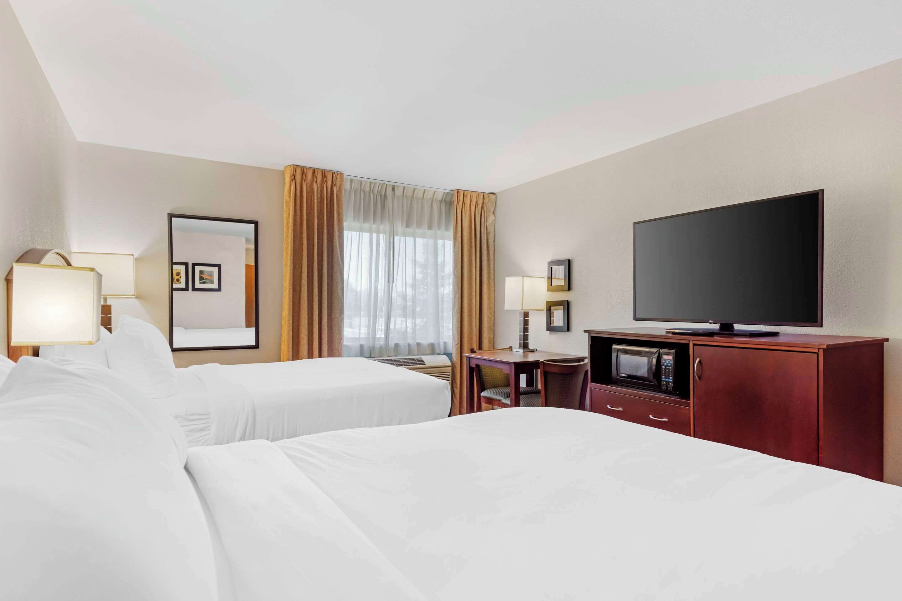 standard room, 2 queen beds, non smoking | premium bedding, desk, iron/ironing board, rollaway beds