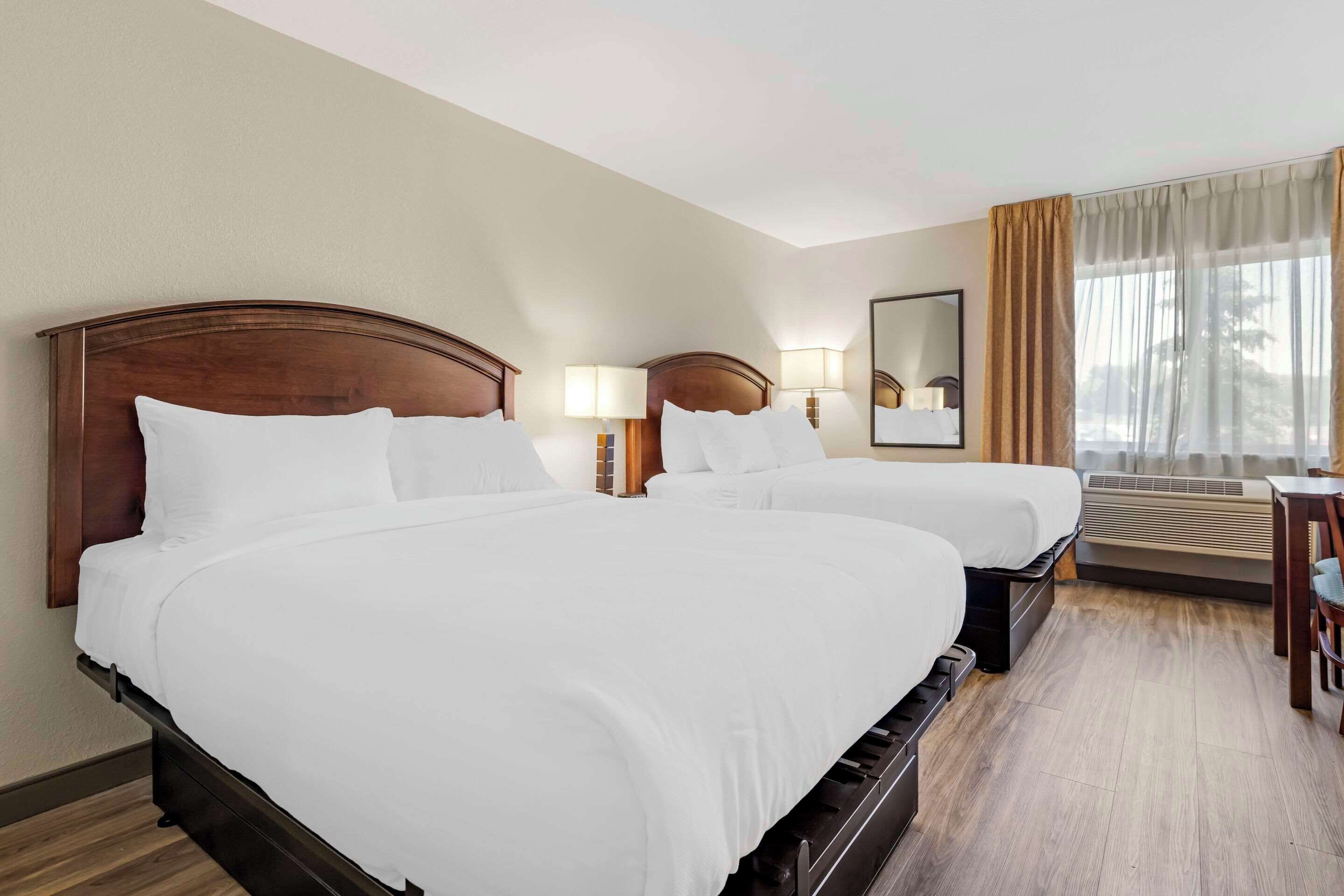 standard room, 2 queen beds, non smoking | premium bedding, desk, iron/ironing board, rollaway beds