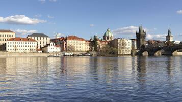 A river with buildings and a bridge.