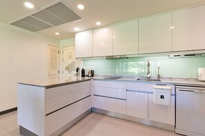 Superior Apartment, 1 Bedroom | Private kitchen | Full-size fridge, microwave, stovetop, toaster - Allamanda Laguna Phuket by RESAVA (Choeng Thale)