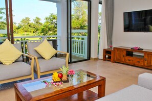 Superior Apartment, 2 Bedrooms | Living area | 42-inch LCD TV with satellite channels, TV - Allamanda Laguna Phuket by RESAVA (Choeng Thale)