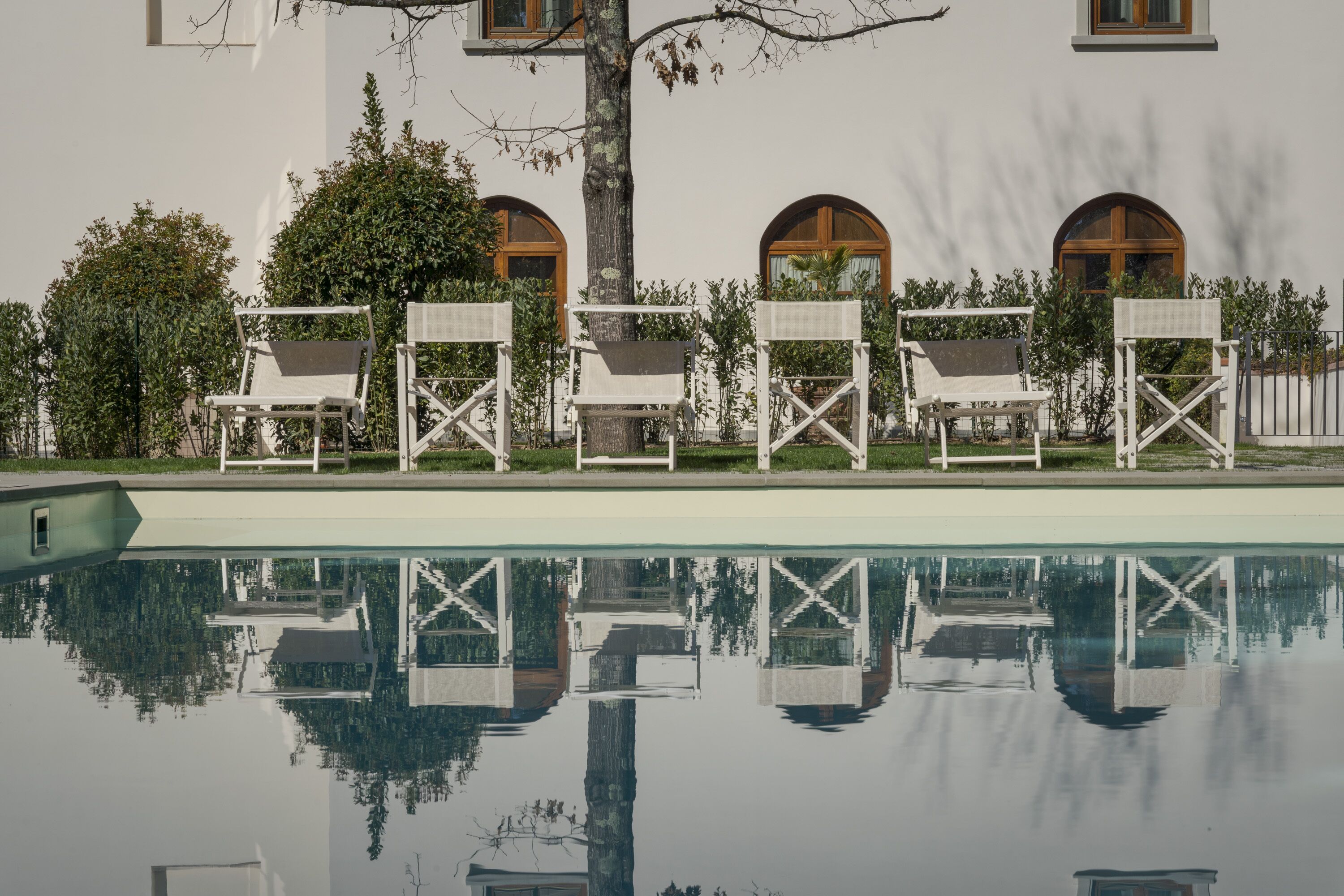 seasonal outdoor pool, open 10:00 am to 7:00 pm, pool umbrellas