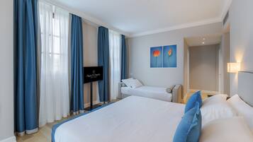 Biancheria da letto di alta qualità, minibar, cassaforte in camera