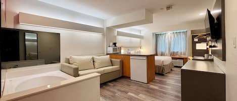 Deluxe Studio Suite, 1 Queen Bed, Non Smoking | Premium bedding, desk, iron/ironing board, free WiFi