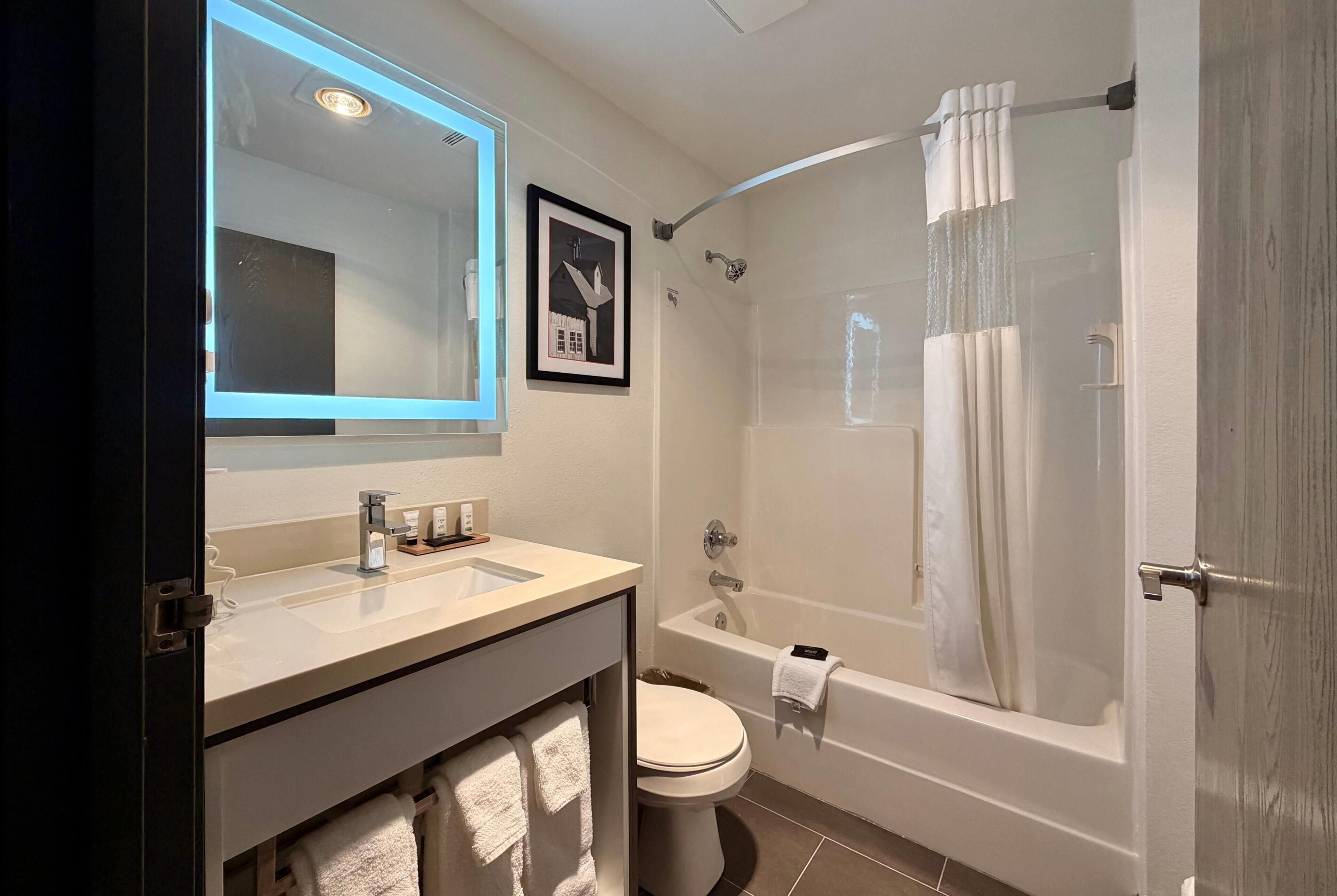 Room, 2 Queen Beds, Non Smoking | Bathroom | Combined shower/tub, free toiletries, hair dryer, towels