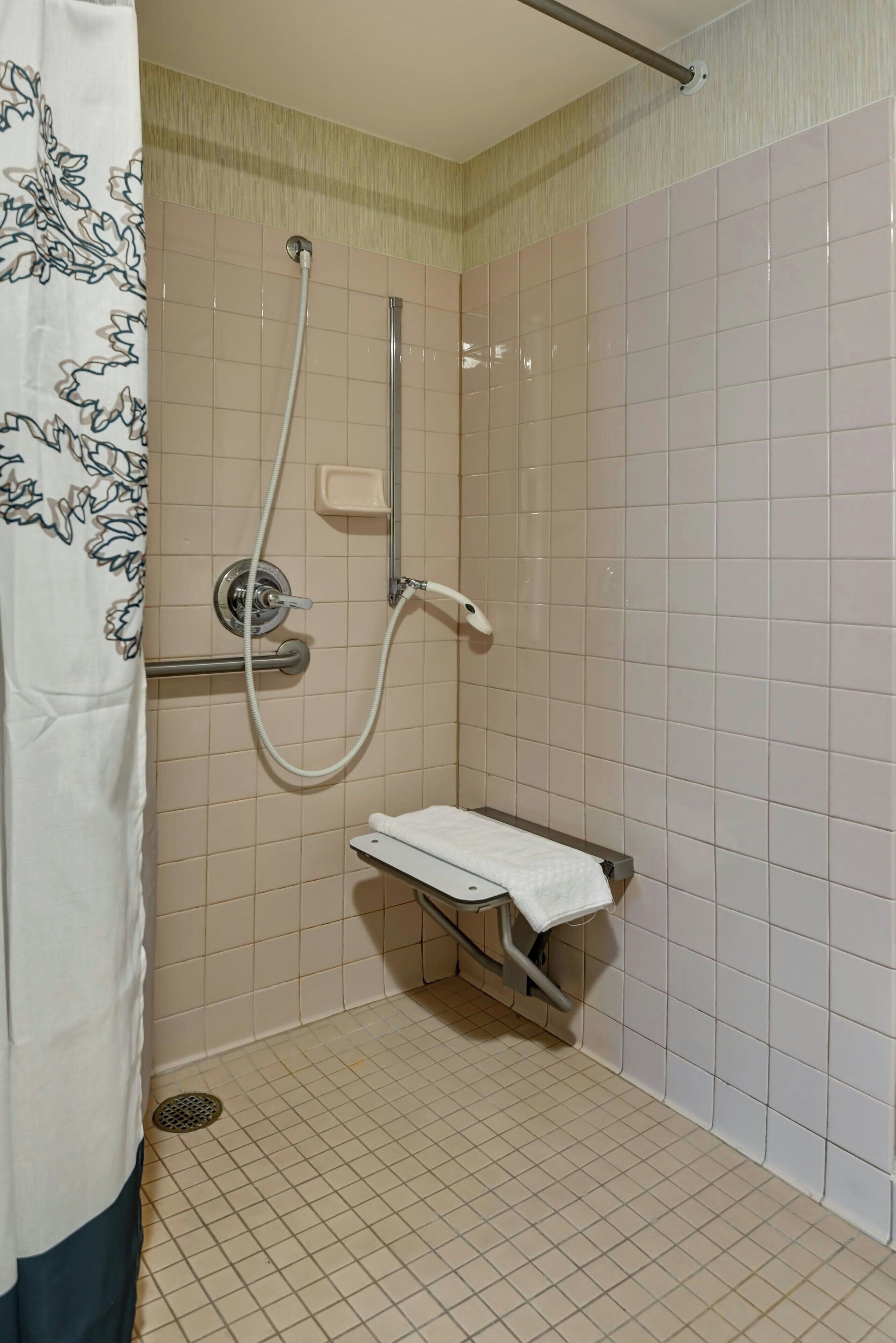 combined shower/bathtub, free toiletries, hair dryer, towels