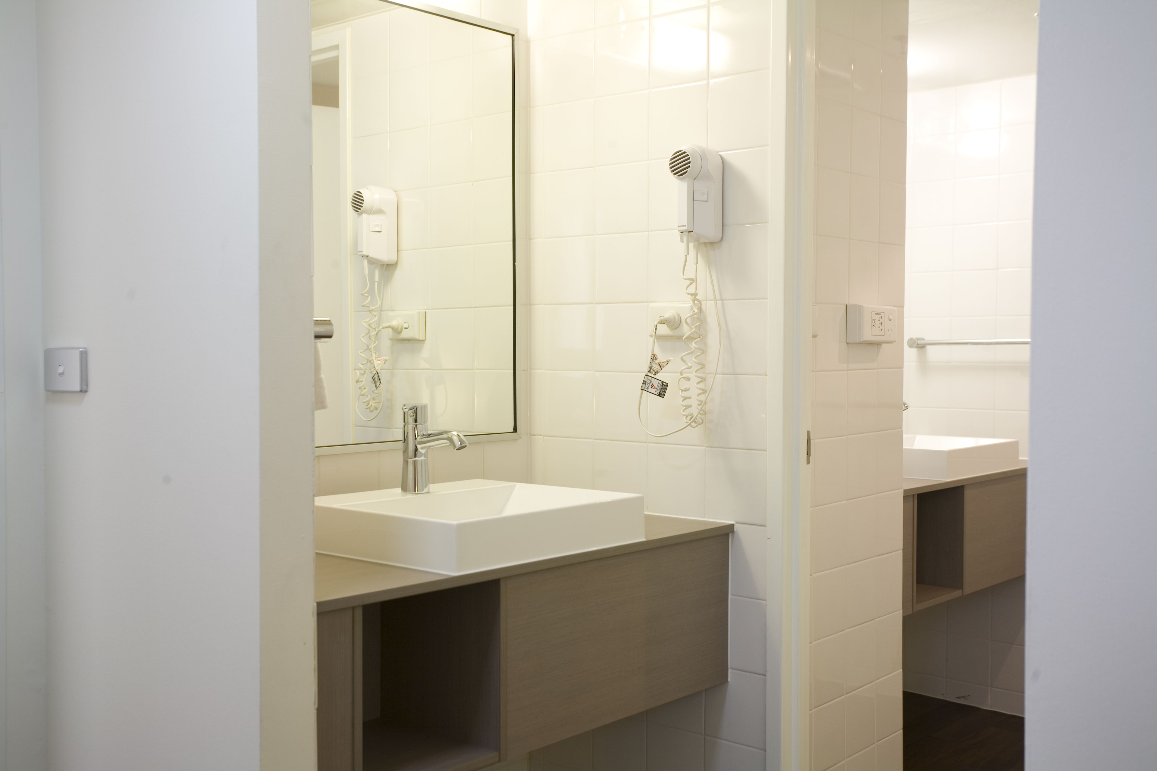 two bedroom apartment | bathroom | eco-friendly toiletries, hair dryer, towels