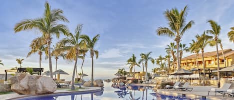 6 outdoor pools, cabanas (surcharge), pool umbrellas