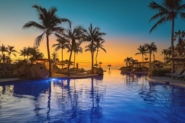 6 outdoor pools, cabanas (surcharge), pool umbrellas