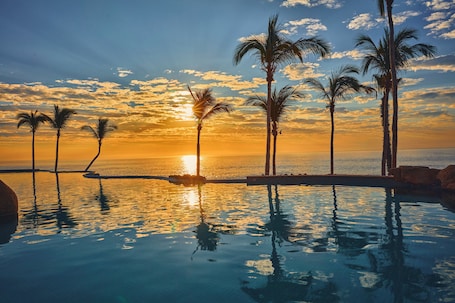 6 outdoor pools, cabanas (surcharge), pool umbrellas