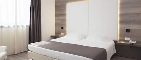 Minibar, desk, laptop workspace, blackout curtains