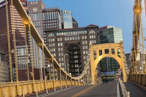 Connecting two city sides, this iconic bridge features a distinctive arch structure and modern architecture.
