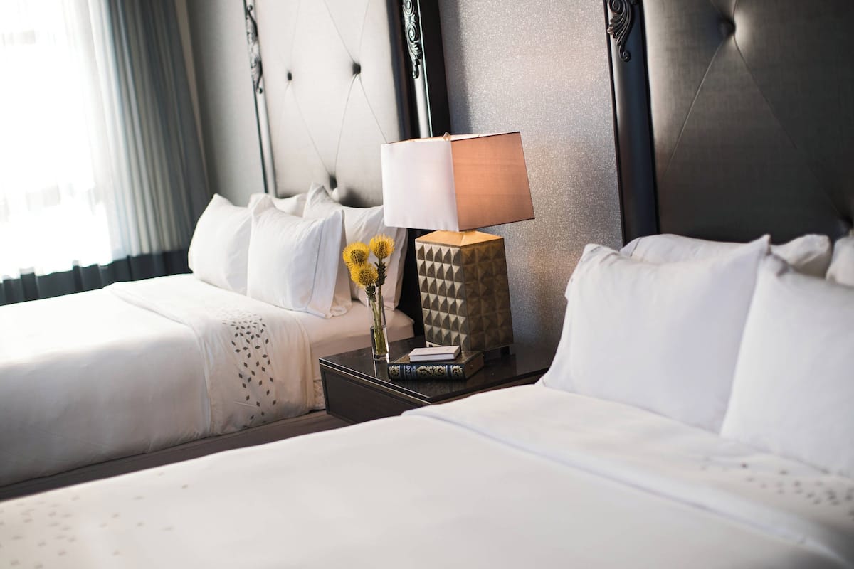 Room, 2 Queen Beds, Non Smoking | Premium bedding, down duvets, pillow-top beds, in-room safe
