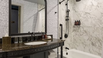 Combined shower/tub, designer toiletries, hair dryer, bathrobes