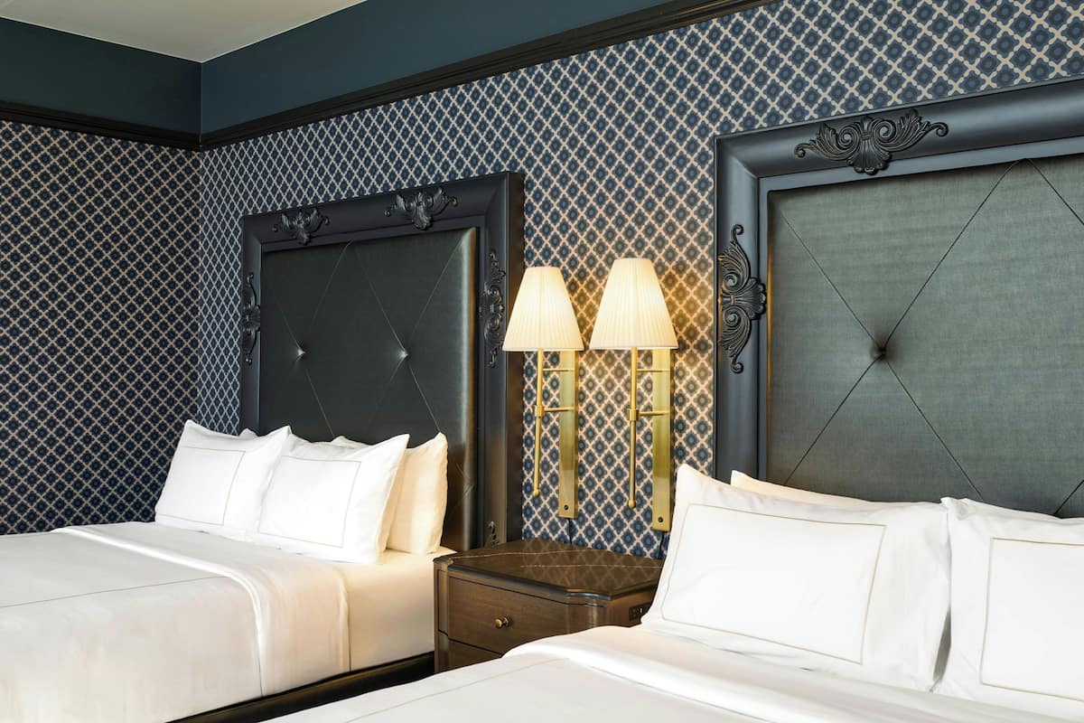 Premium bedding, down comforters, pillowtop beds, in-room safe