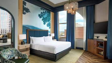 Premium bedding, down comforters, pillowtop beds, in-room safe