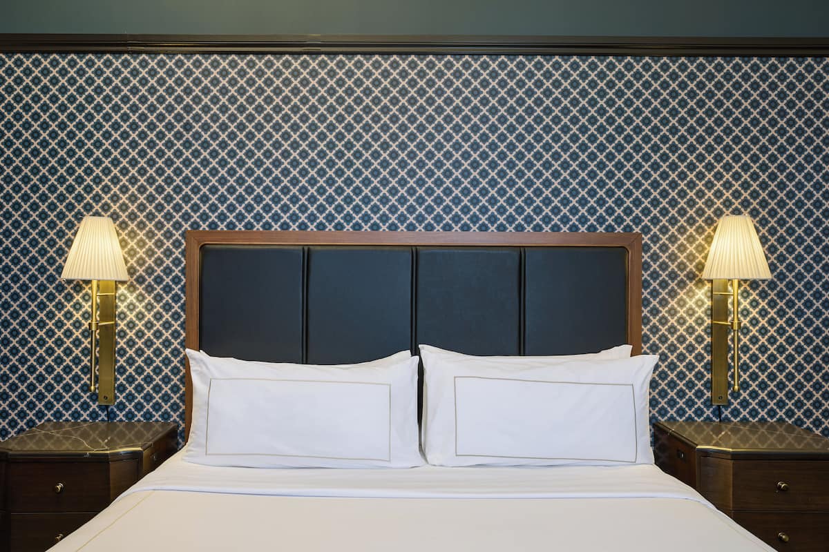 Premium bedding, down comforters, pillowtop beds, in-room safe