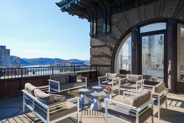 Premium bedding, down comforters, pillowtop beds, in-room safe