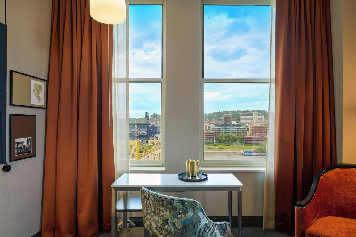Premium bedding, down comforters, pillowtop beds, in-room safe