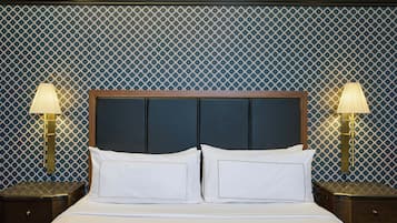 Premium bedding, down comforters, pillowtop beds, in-room safe