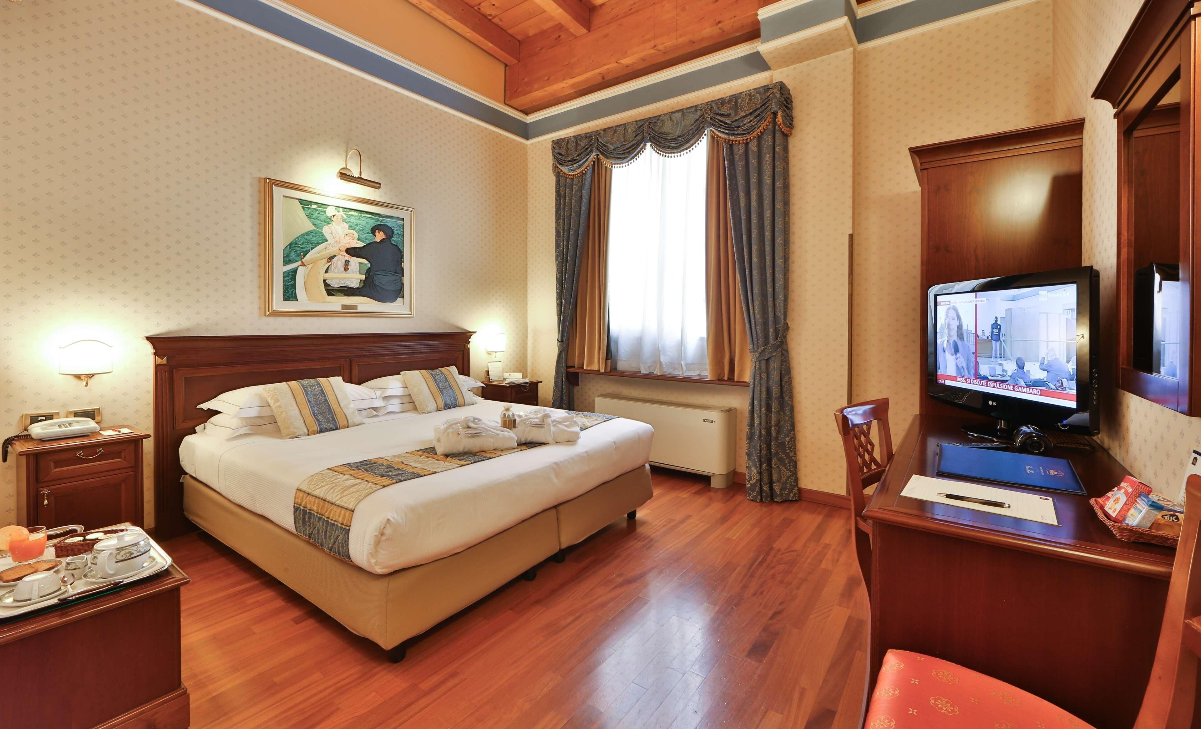Down duvets, minibar, in-room safe, desk