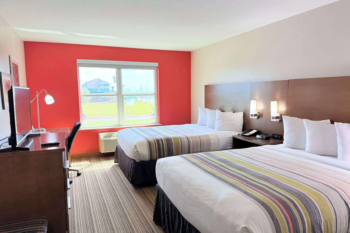 room, 2 queen beds, non smoking | 1 bedroom, premium bedding, desk, blackout curtains