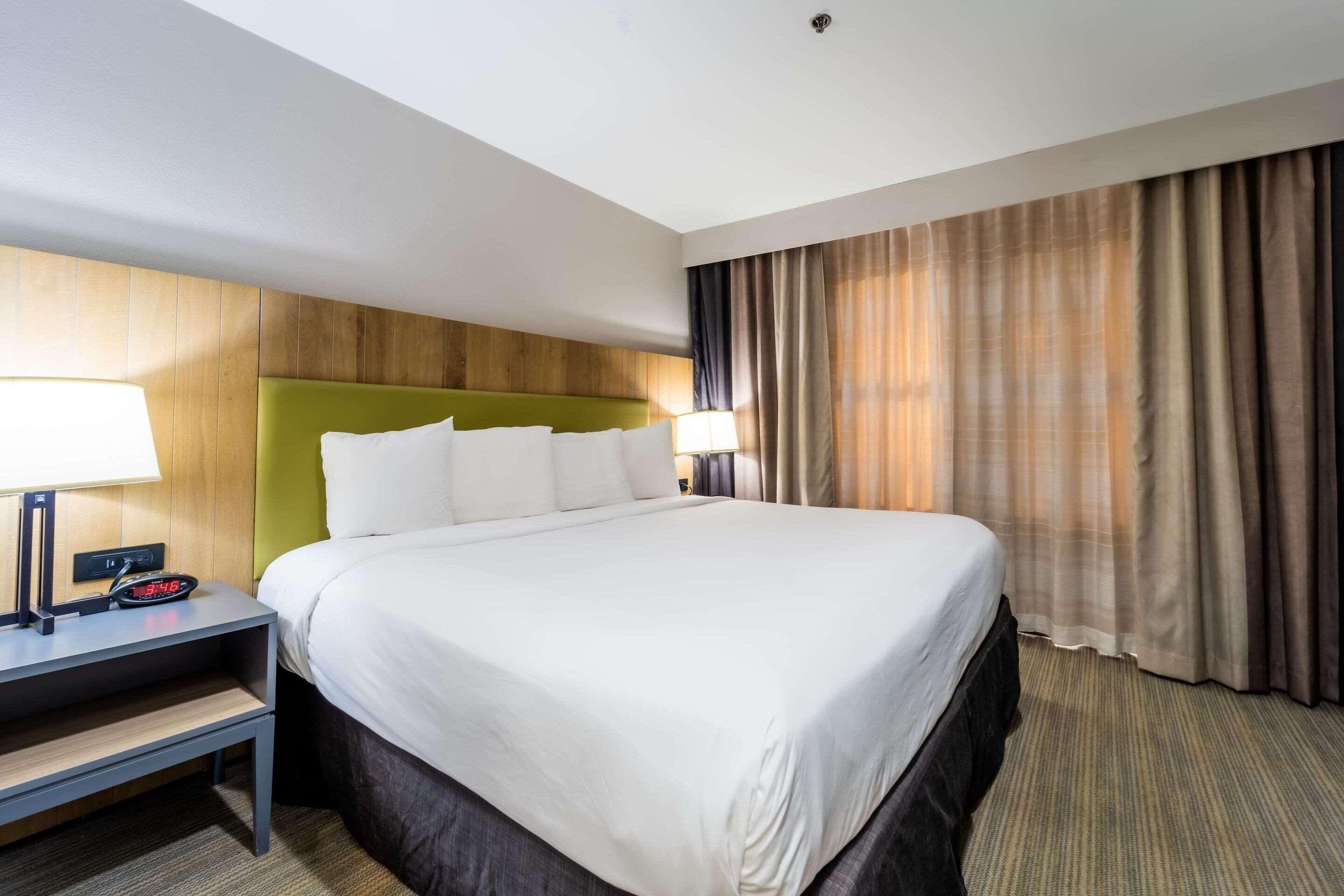 suite, 1 bedroom, non smoking | desk, laptop workspace, iron/ironing board, free cots/infant beds