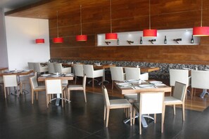 Breakfast, lunch, dinner served; international cuisine