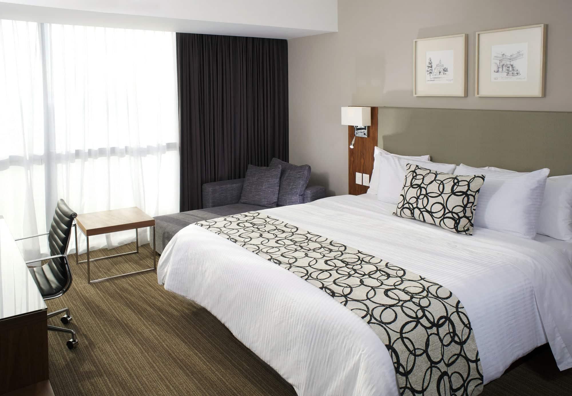 Premium bedding, down comforters, Select Comfort beds, in-room safe