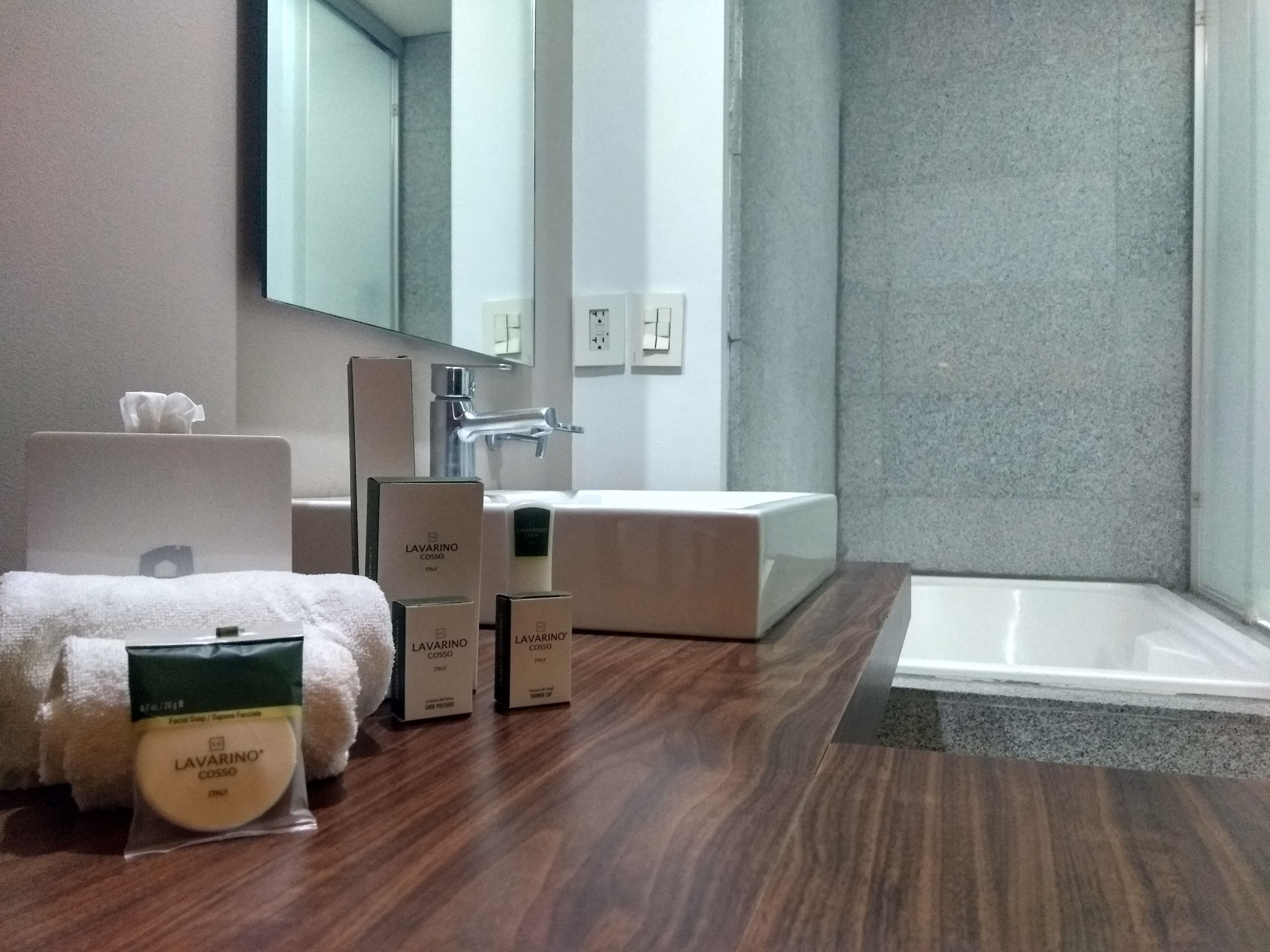 junior room, 1 king bed | bathroom | free toiletries, hair dryer, towels